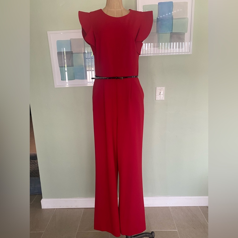 Women’s size 12 Red Calvin Klein jumpsuit with black belt.